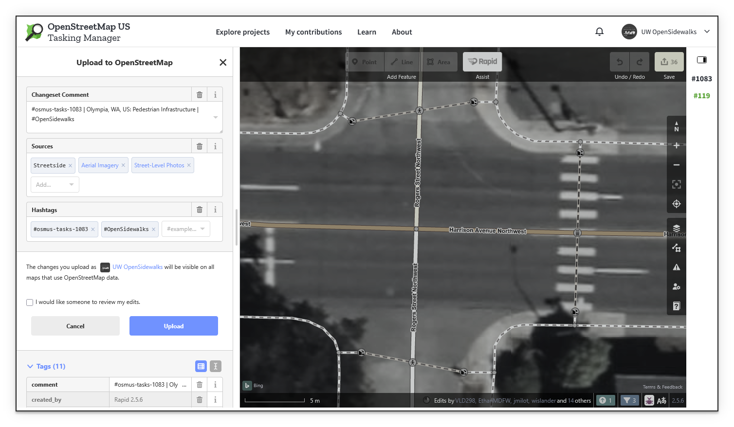 Screenshot of the Upload to OpenStreetMap dialog in Rapid, showing the pre-filled changeset comment with the Tasking Manager project name, the sources field with Streetside and Aerial Imagery selected, and the project hashtags.